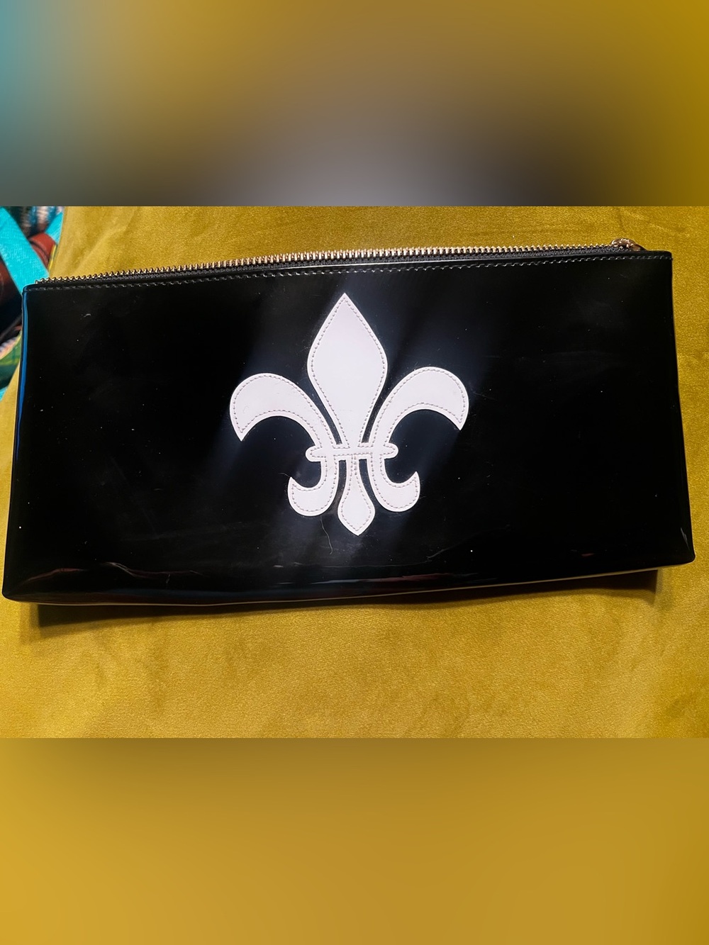 Lolo Glossy Black Patent Clutch with White Fleur-de-Lis Applique